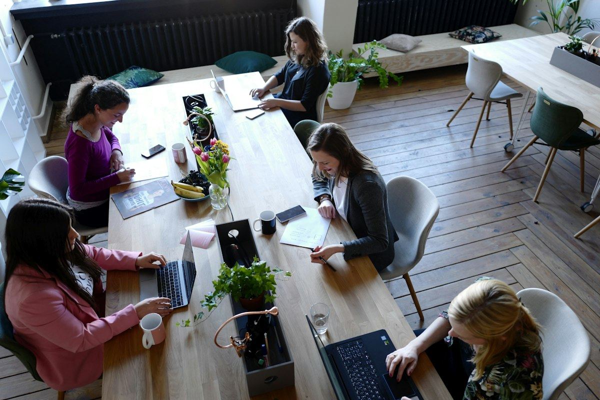 A team working around a table in an open office