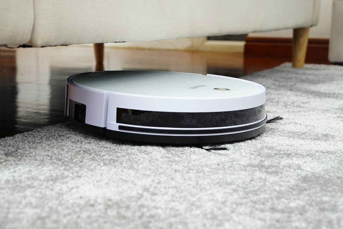 A cleaning machine working across an office carpet