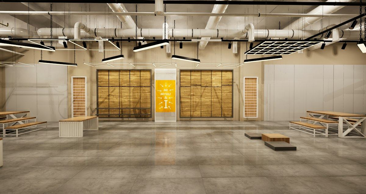 A large empty industrial-style space with an exposed ceiling