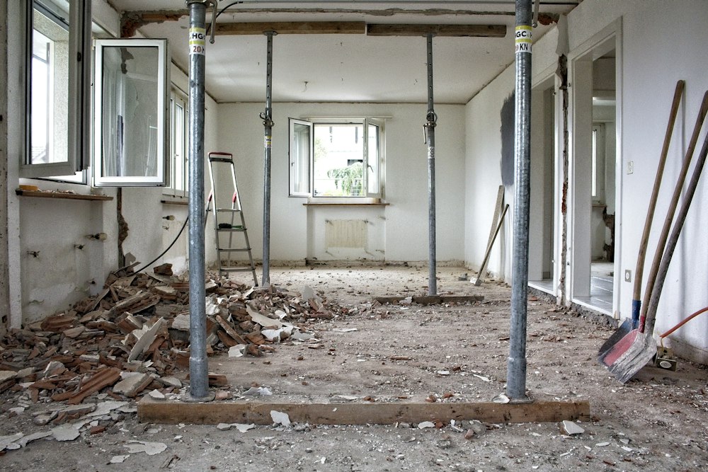 A room after building work, with dust and debris ready to be cleared