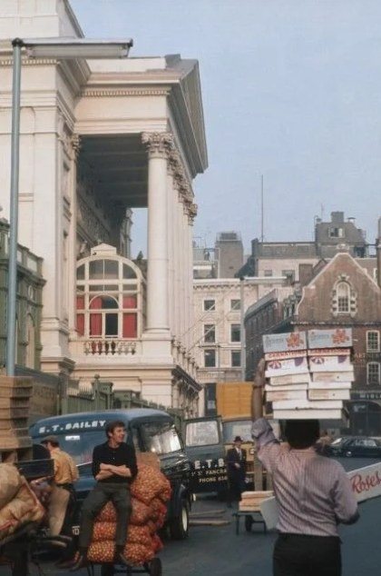 Market porters and lorries beside the Royal Opera House in Covent Garden, in an archive photograph