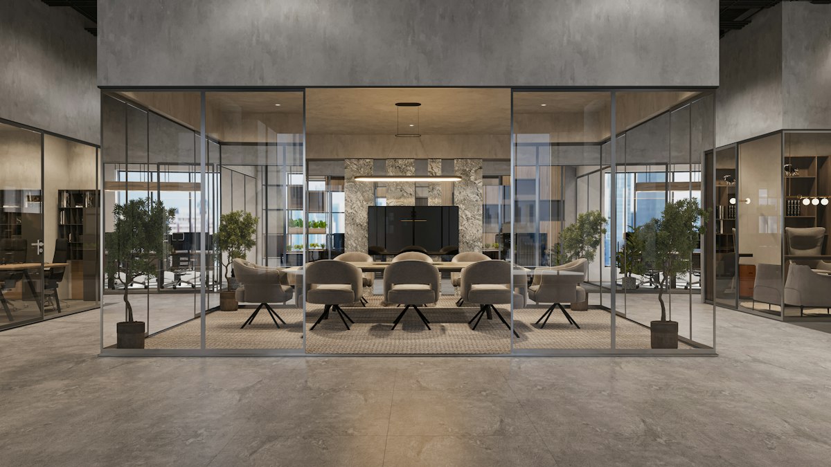 A glass-walled meeting room with a long table, the kind of City of London office we clean
