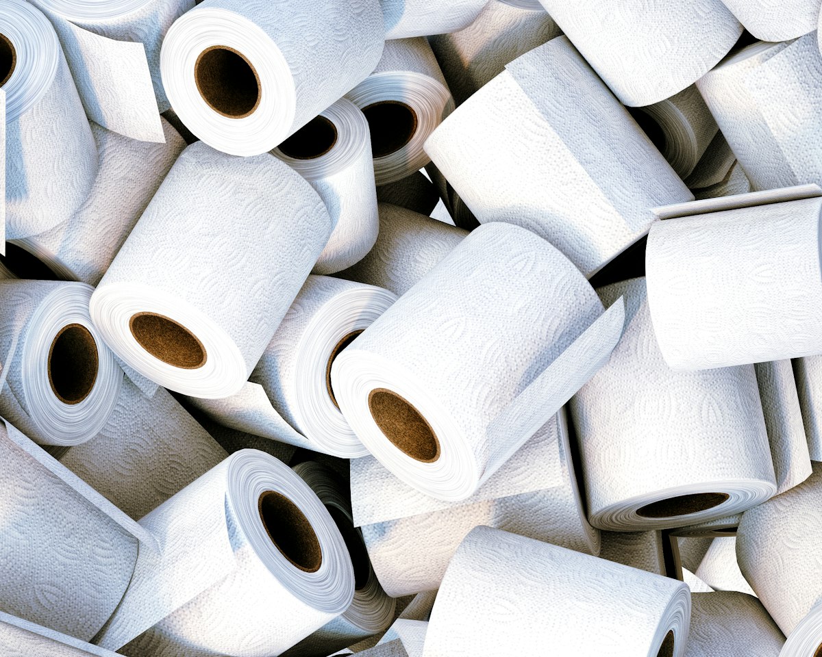 A stack of toilet rolls, one of the consumables we supply and restock